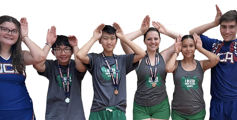 4 teens and 2 young adults, all in athletic clothing, face the camera and make the ASL sign for "terrier", the mascot for Washington School for the Deaf