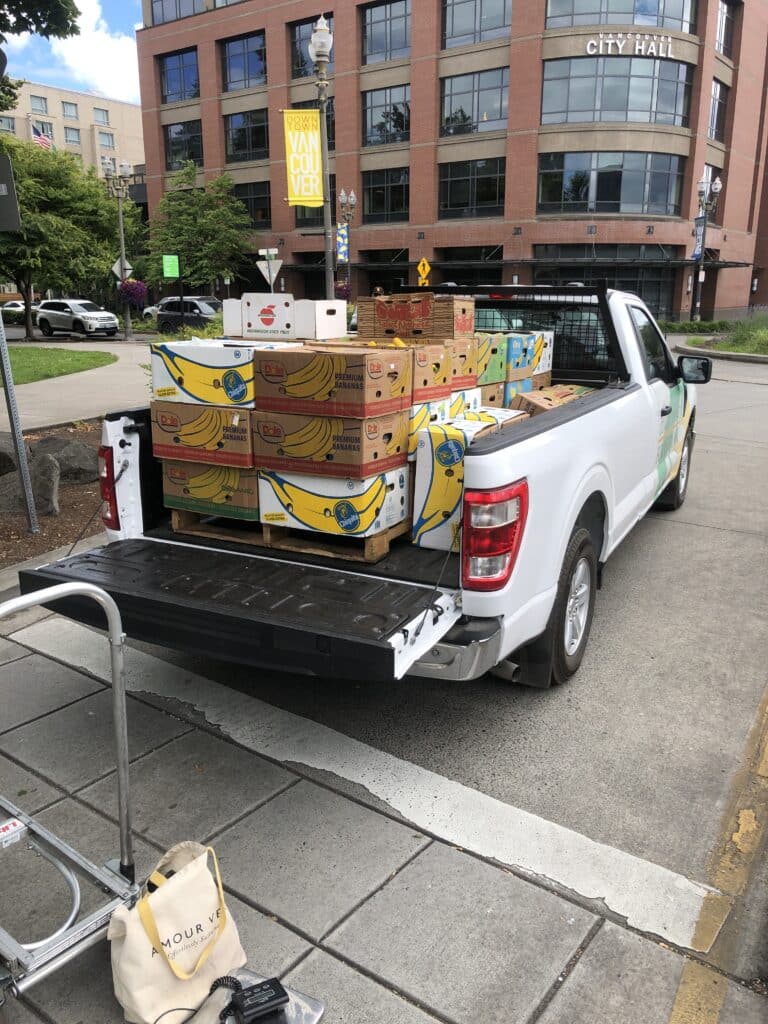 Clark County Food Bank's farm team cleans produce from Vancouver Farmers Market. Photo courtesy Clark County Food Bank.