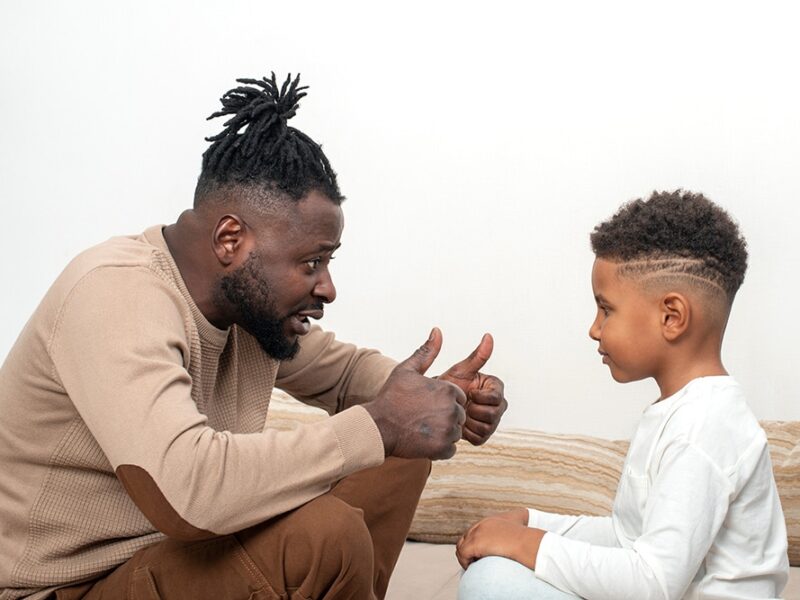 A Black father talks to his son