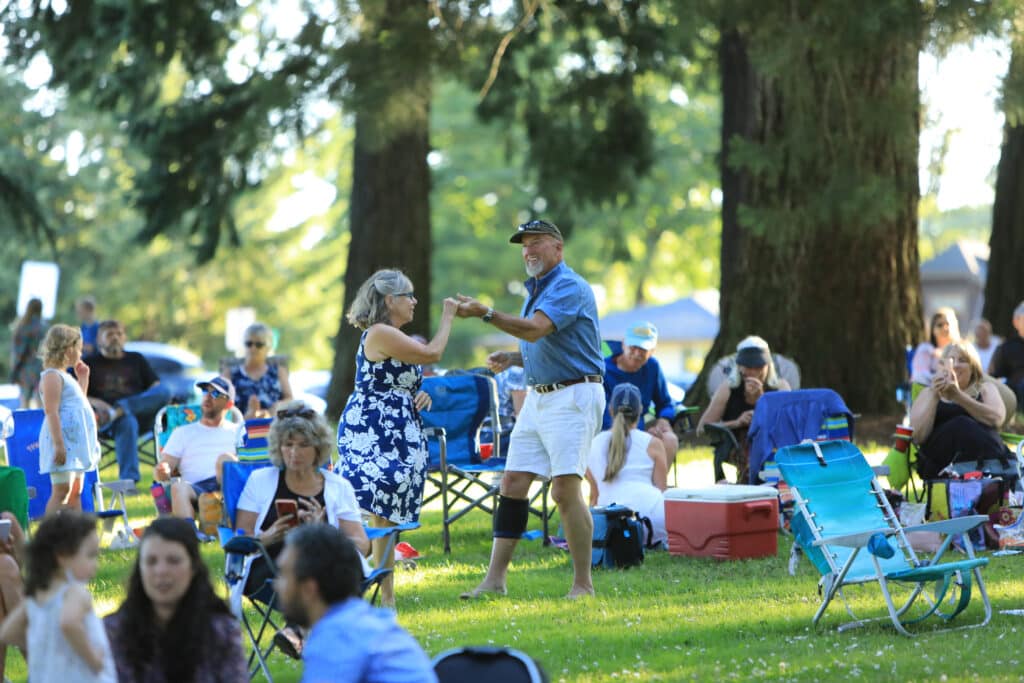 A crowd enjoys Summer Concerts and Movies in the Parks
