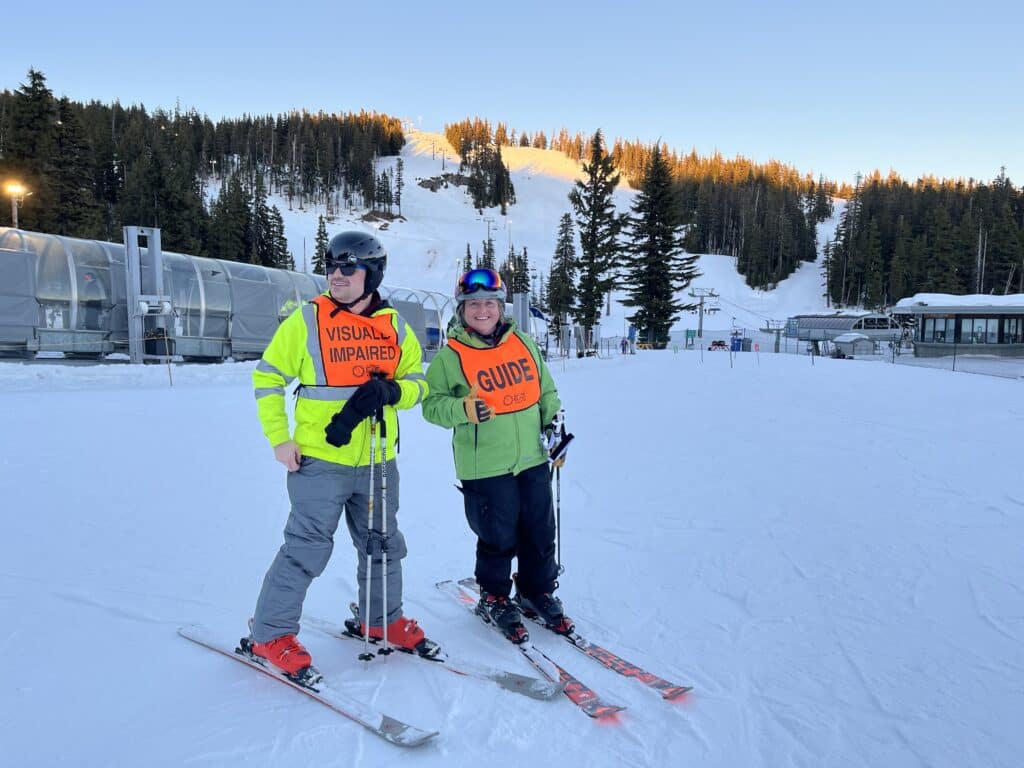 Northwest Association for Blind Athletes - Athlete Bob Cavanaugh skis with instructor, Brittany Casperson