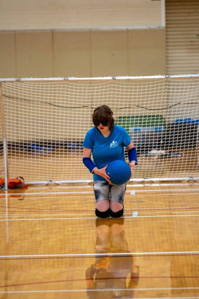 Northwest Association for Blind Athletes - Teen athlete Maggie R., plays a game of goalball.