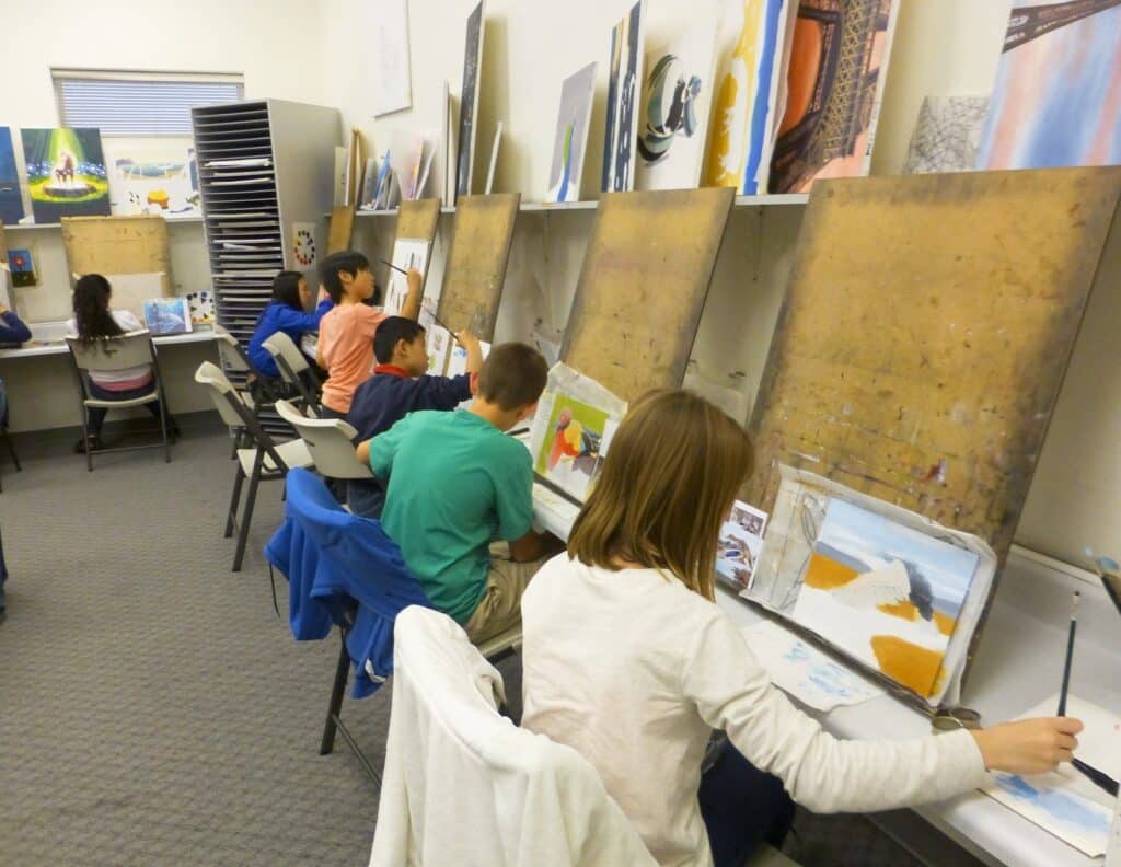 Kids paint in a studio. Art Spaces in Vancouver.