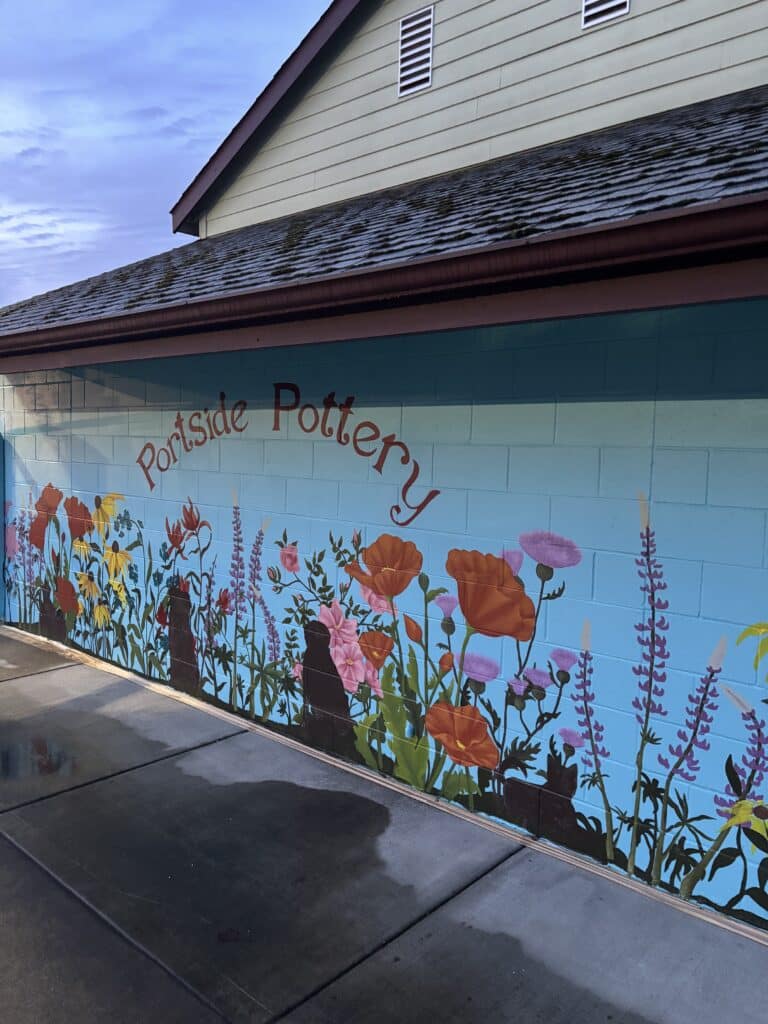 Outside of a building with a colorful mural. Art Spaces in Vancouver.